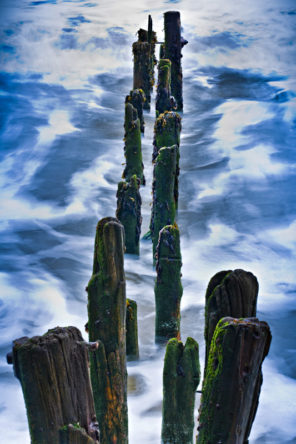Whitby waves and piles Wallpaper mural
